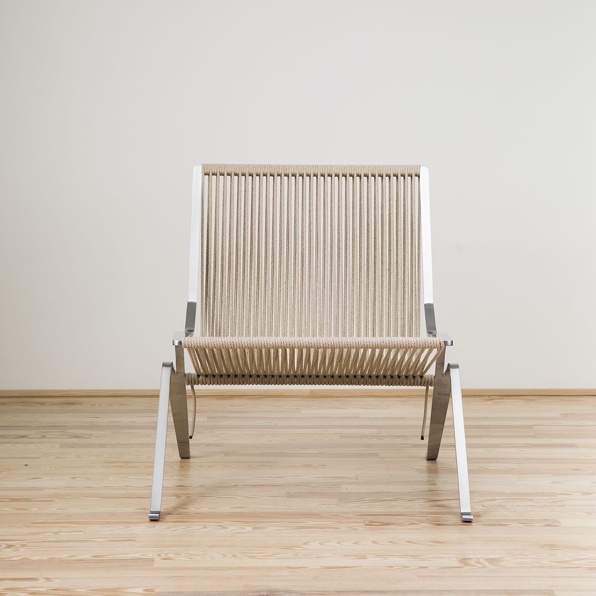 Sillón PK25 diseñado por Poul Kjaerholm y editado por Fritz Hansen