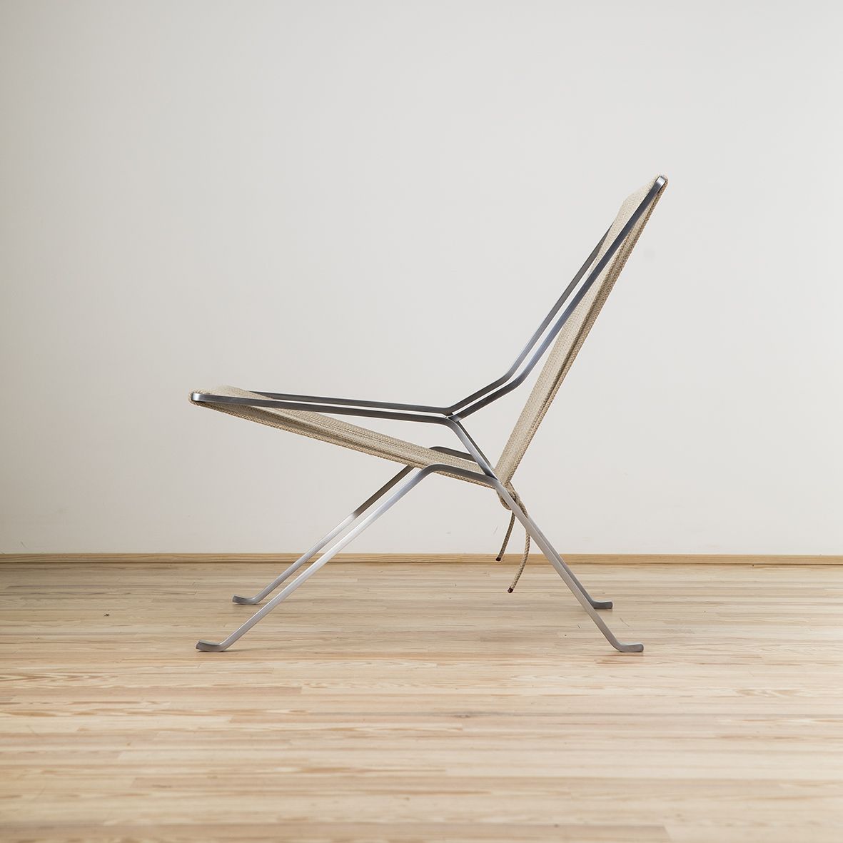 Sillón PK25 diseñado por Poul Kjaerholm y editado por Fritz Hansen