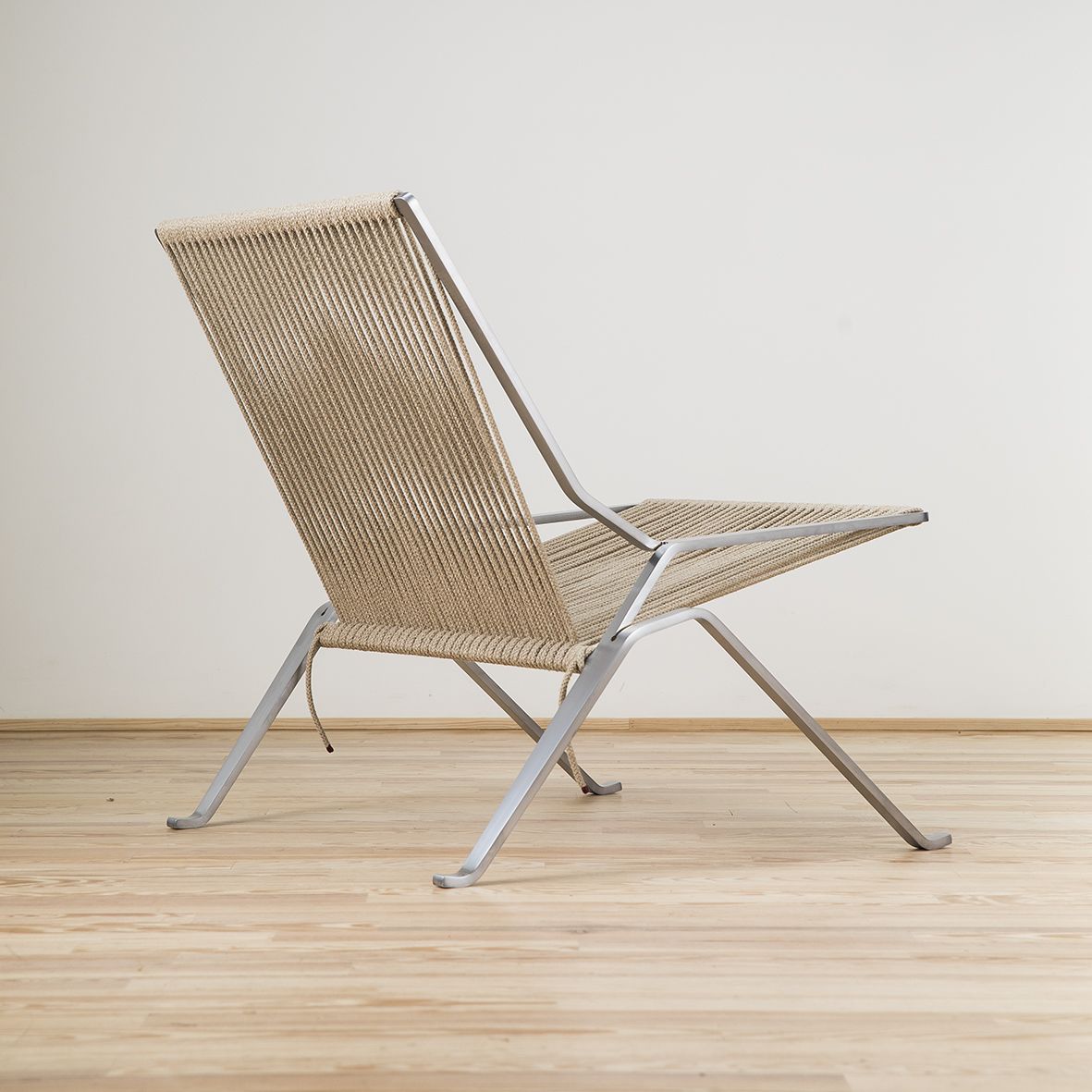 Sillón PK25 diseñado por Poul Kjaerholm y editado por Fritz Hansen