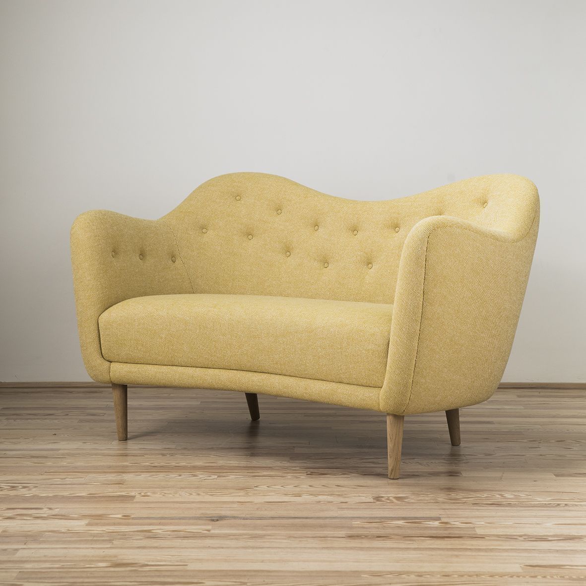 Sofá 46 diseñado por Finn Juhl y editado por OneCollection