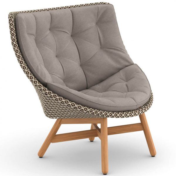 Sillón orejero Mbrace con reposapiés - Dedon